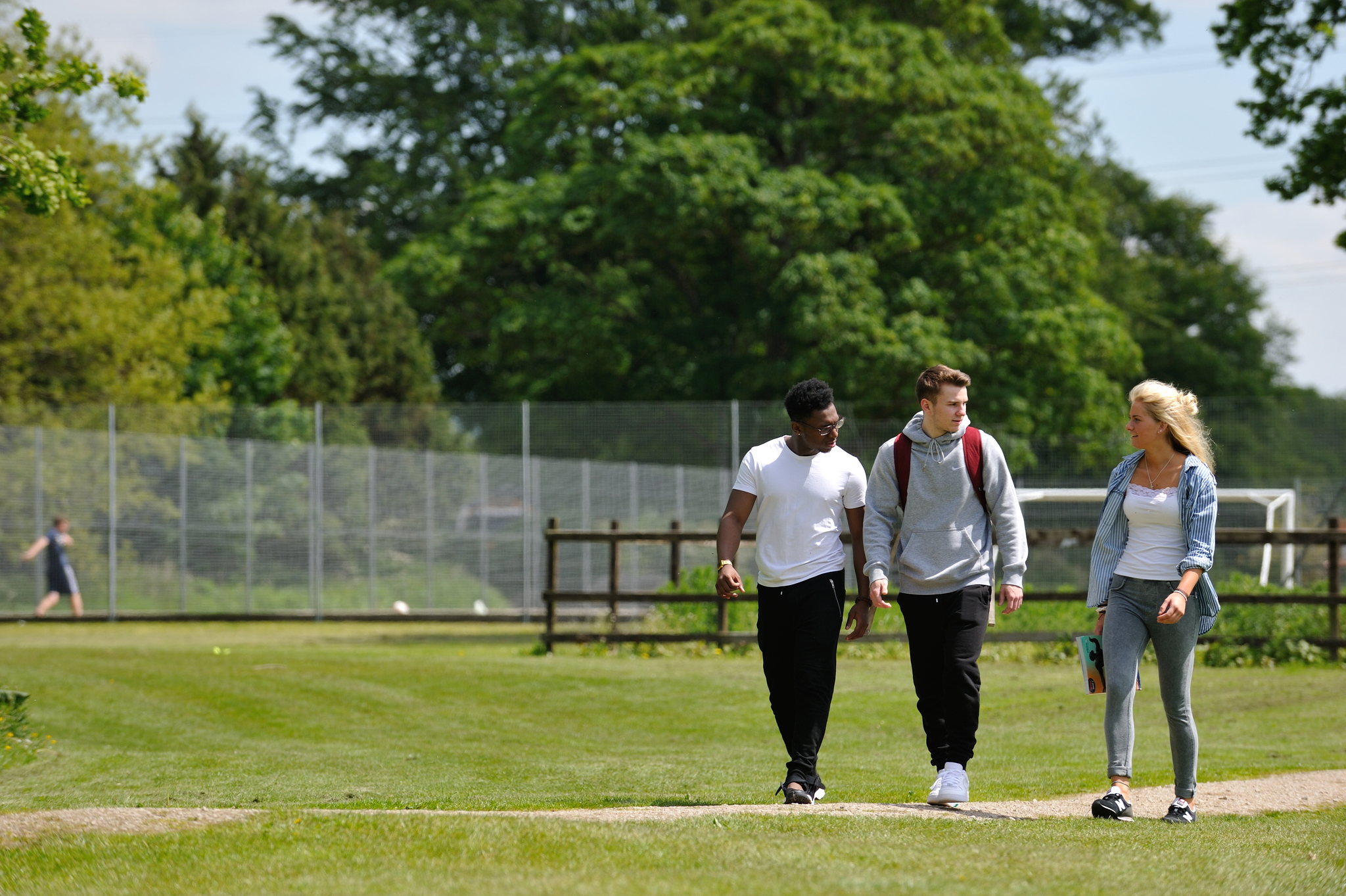 students walking across campus